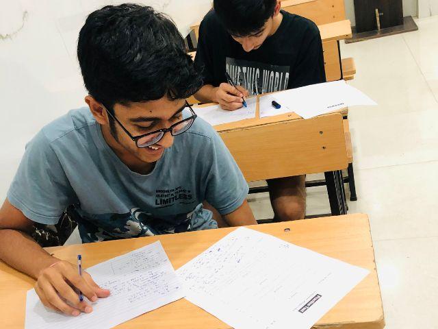students giving exam